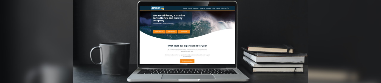 A laptop showing the abpmer.co.uk homepage